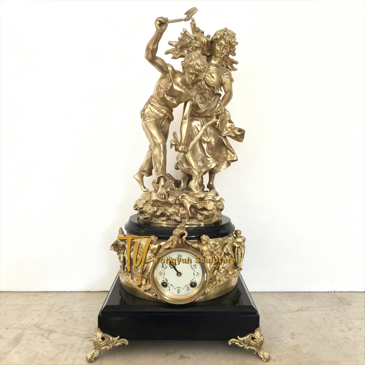 Antique Palatial French Gilded Bronze Mantel Clock With Two Angles Sculpture For Sale.jpg