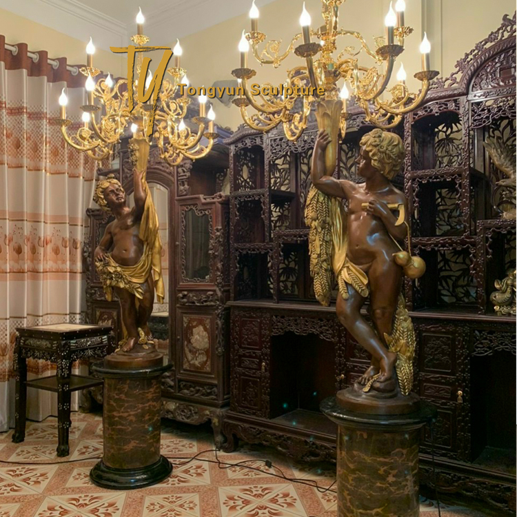 Louis Sauvageau Pair of Bronze Candelabra with Cherubs holding Lights France 19th Century.jpg