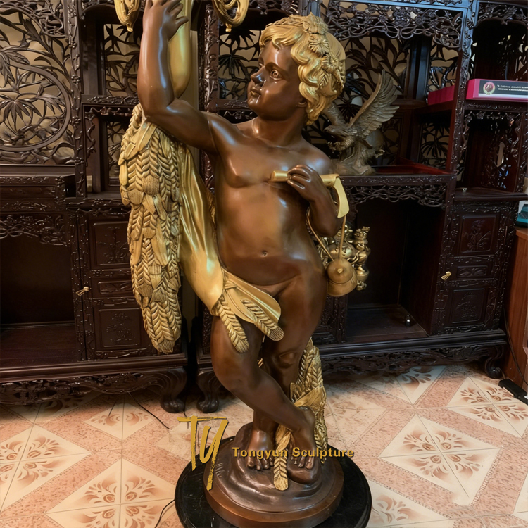 Louis Sauvageau Pair of Bronze Candelabra with Cherubs holding Lights France 19th Century.jpg