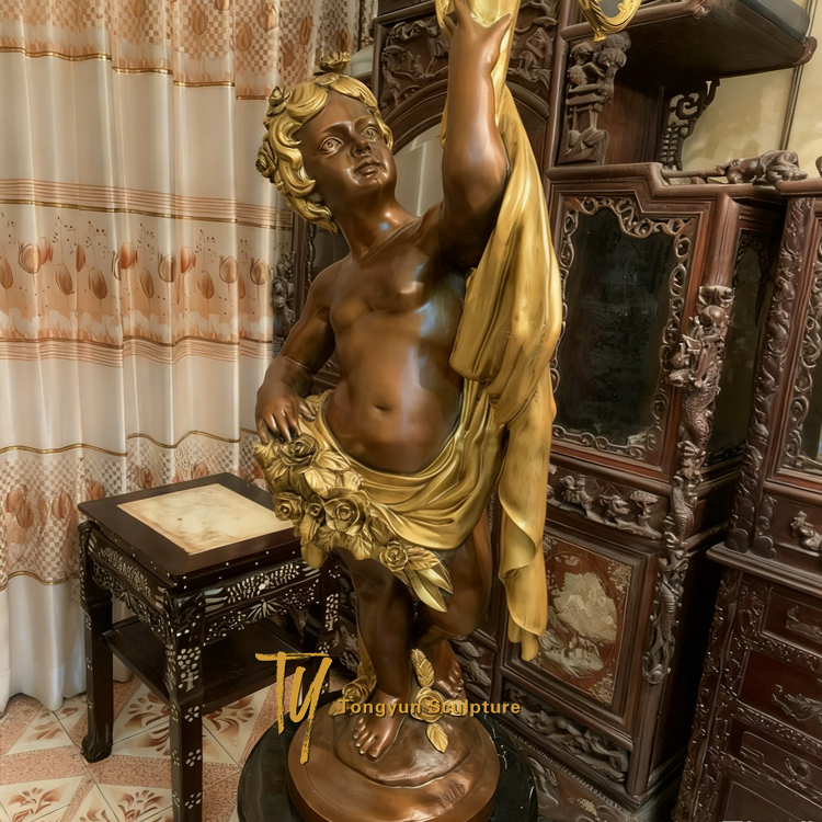 Louis Sauvageau Pair of Bronze Candelabra with Cherubs holding Lights France 19th Century.jpg